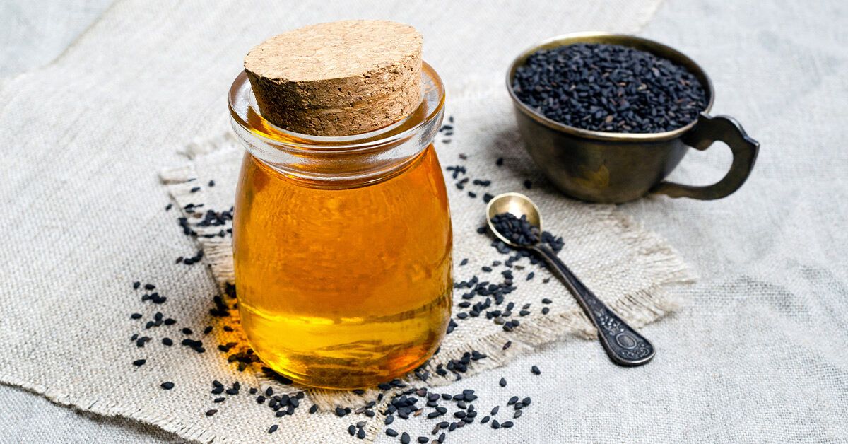 قیمت عسل سیاه دانه مرغوب شیشه 2 کیلویی + فروش عمده