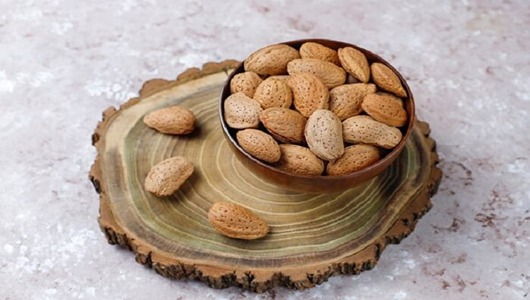 قیمت و فروش مغز بادام سنگی ایرانی + عمده مخصوص صادرات