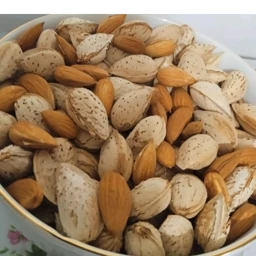 فروش مغز بادام پوست کاغذی خام + قیمت عمده