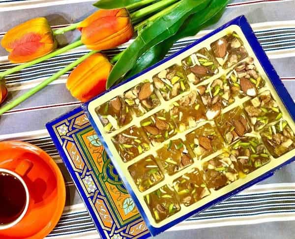 قیمت خرید حلوا مسقطی لاری با مغز گردو عمده به صرفه و ارزان