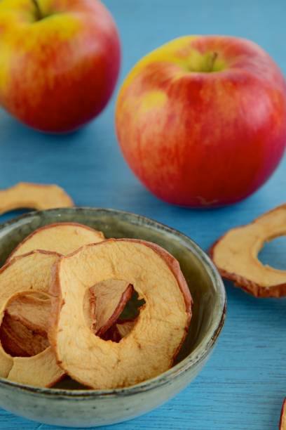 قیمت خرید سیب خشک پفکی عمده به صرفه و ارزان