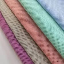 فروش عمده پارچه فلامنت ورزشی سوزنی و کندویی دیبافت + نازلترین قیمت