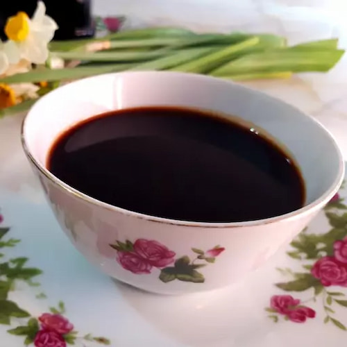 تصویر 3 از شیره خرما غلیظ با طعم طبیعی و رنگ تیره براق