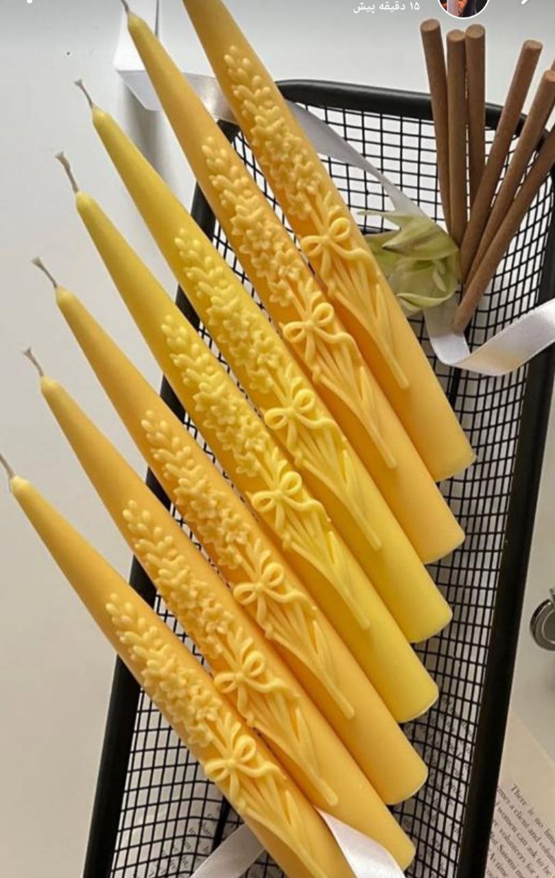 شمع قلمی با طراحی زیبا و مناسب تزیین میز جشن‌ ها