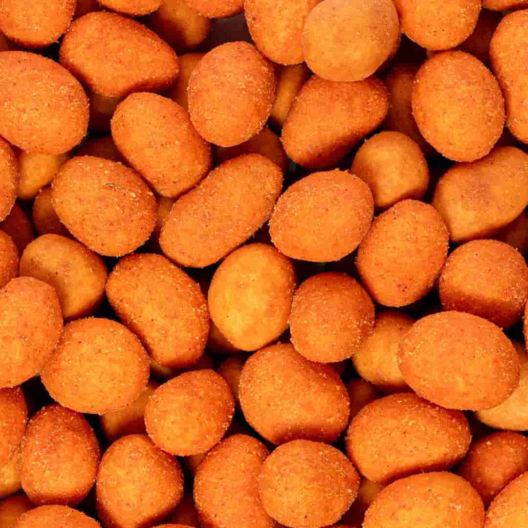 تصویر 2 از بادام زمینی روکش دار گوجه‌ ای یکی از تنقلات خوش‌ طعم و لذیذ