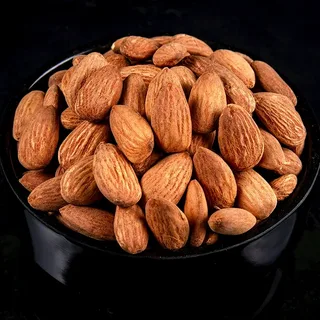 بادام درختی خام شور با کیفیت عالی و طعم خاص