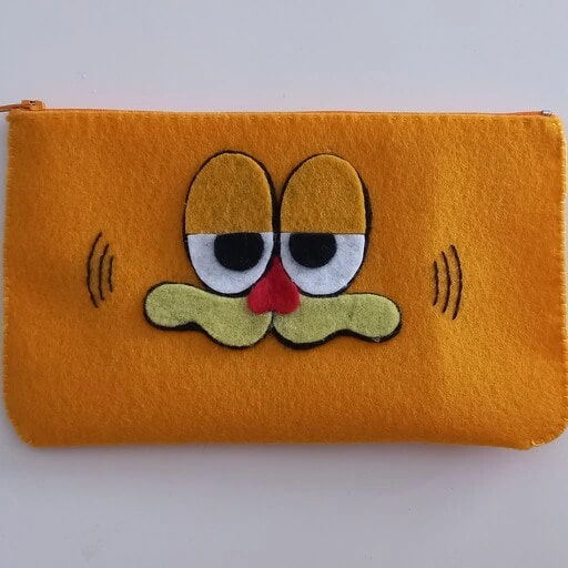 تصویر 4 از کیف لوازم آرایش نمدی فانتزی با طراحی رنگارنگ و جذاب