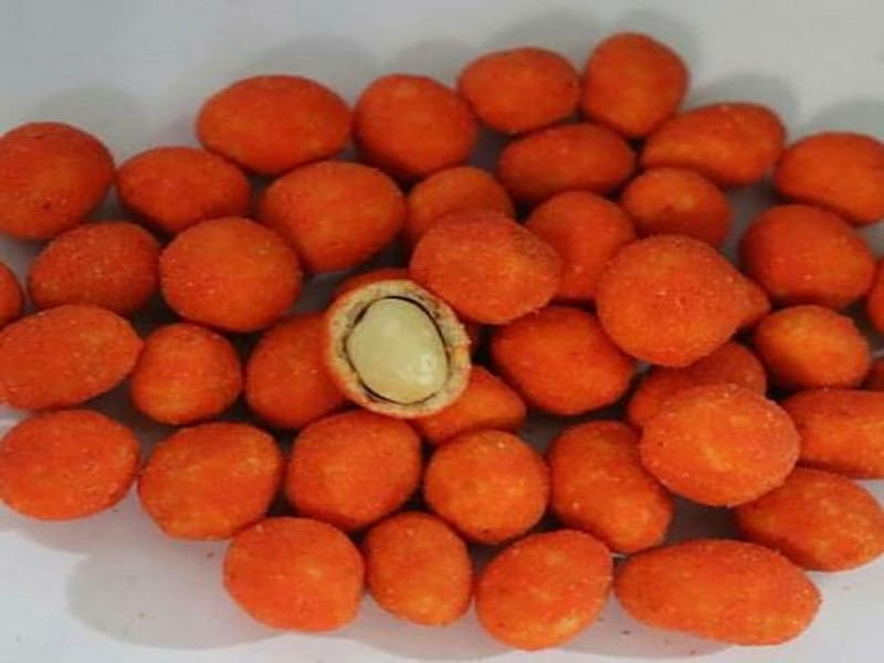 بادام زمینی کچاپ روکشدار با لایه های طعم‌ دار متنوع و بافت ترد