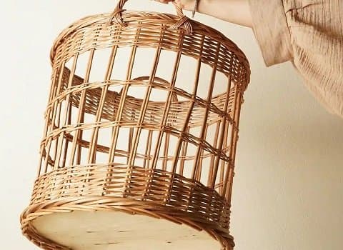 تصویر 2 از سبد لاندری حصیری استوانه ای با طراحی ساده و مدرن