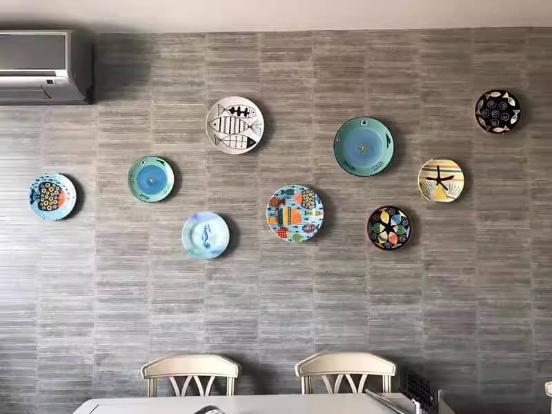 تصویر 1 از بشقاب دکوری دیواری با طرح هندسی و رنگ‌های متنوع