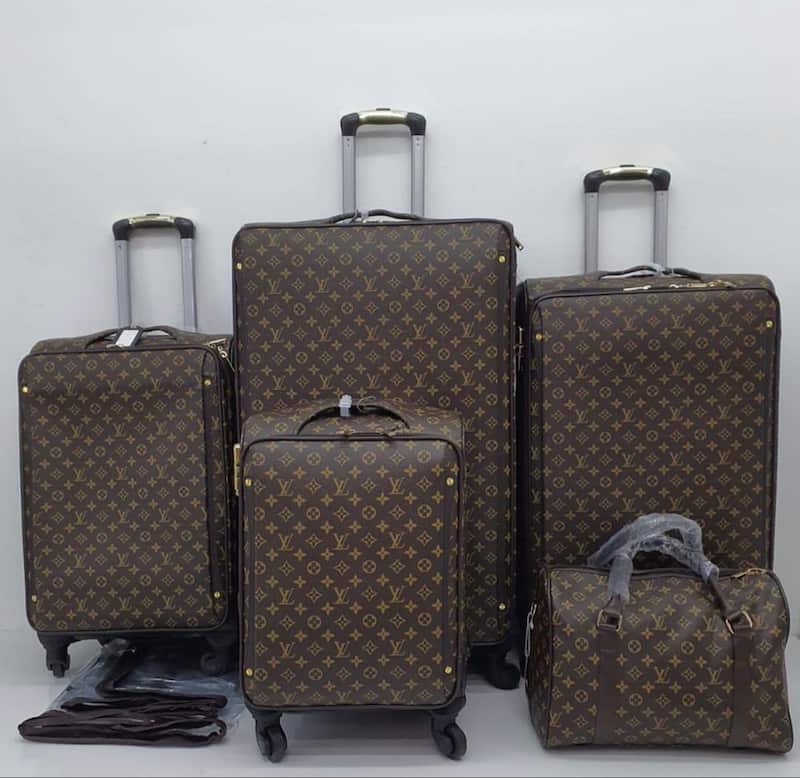 تصویر 2 از چمدان مسافرتی برزنتی سخت پوسته با مقاومت بالا در برابر ضربه