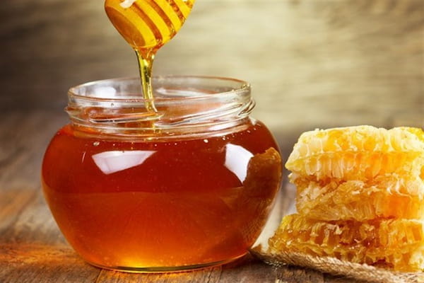 خرید عسل طبیعی با موم چوبی